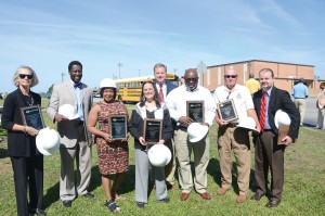 From last summer’s ceremonial groundbreaking where the state of the art new Career and Technology Center now stands are School Board Chairwoman Beth Reid, Superintendent Dr. J.R. Green, District 4 Board member Annie McDaniel, District 2 Board member Paula Hartman, State Sen. Creighton Coleman (rear), District 3 Board member Henry Miller, former District 5 Board member Bobby Cunningham and District 6 Board member William Frick.